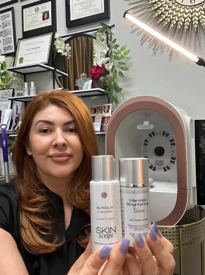 Leticia holding Skin Script cleanser and serum beside the skin analyser